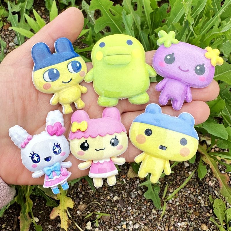 45mm Cartoon Tamagotchi double - Phone Accessories Beads recension och pris